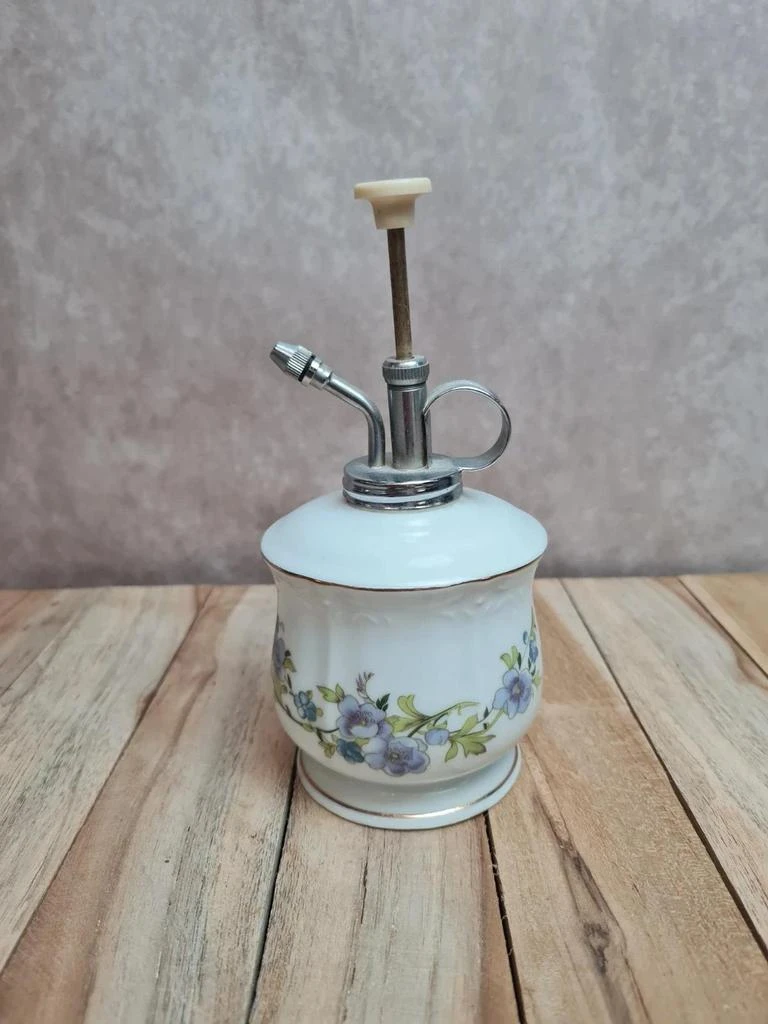 Pulvérisateur ancien en porcelaine décor floral – objet de toilette vintage 🌸